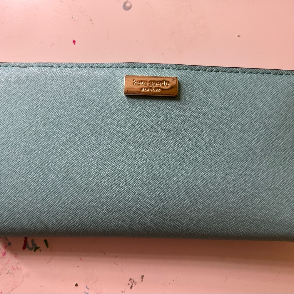 kate spade Blue and Gold Wallet with Sleek Design